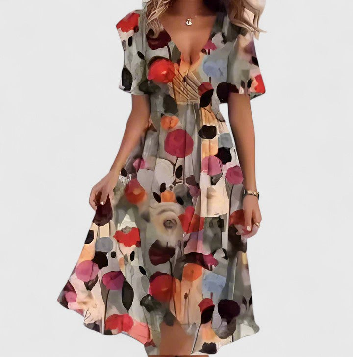 Back view displaying flutter sleeve design and draping
