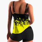 Close-up of turquoise floral print fading from black at tankini top