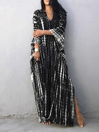 Model in caftan dress, relaxed standing pose