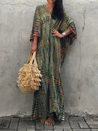 Back view of caftan dress on model