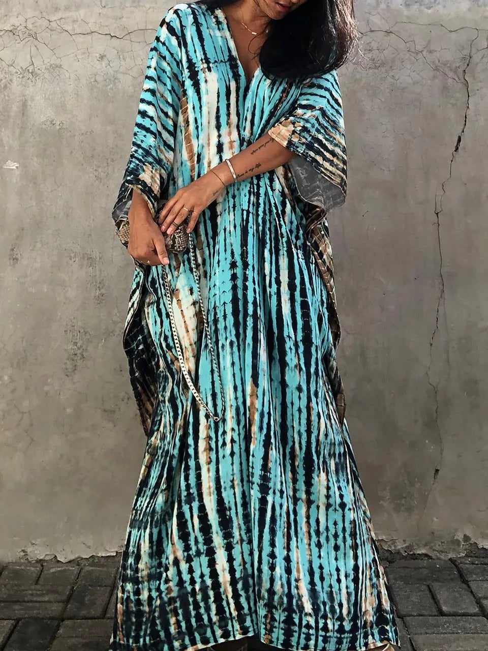 Model wearing caftan, front-facing pose
