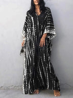 Caftan dress showing relaxed fit through torso