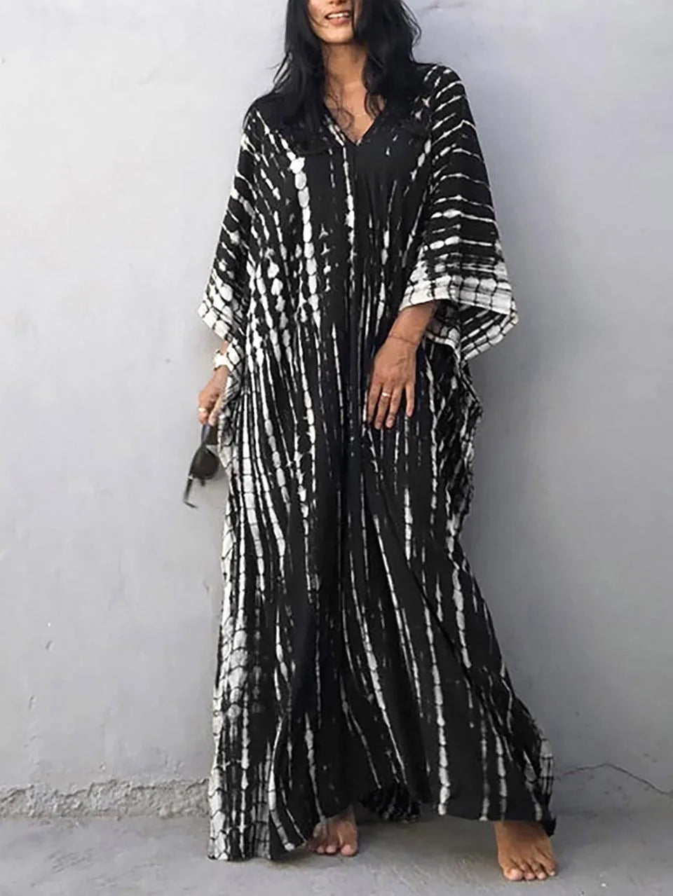 Caftan dress showing relaxed fit through torso