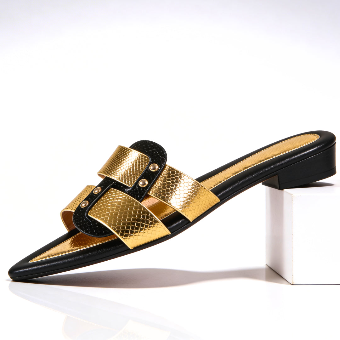 Close-up of gold-tone hardware and black snake-effect strap detail