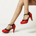 Model walking in white T-strap heels, motion shot