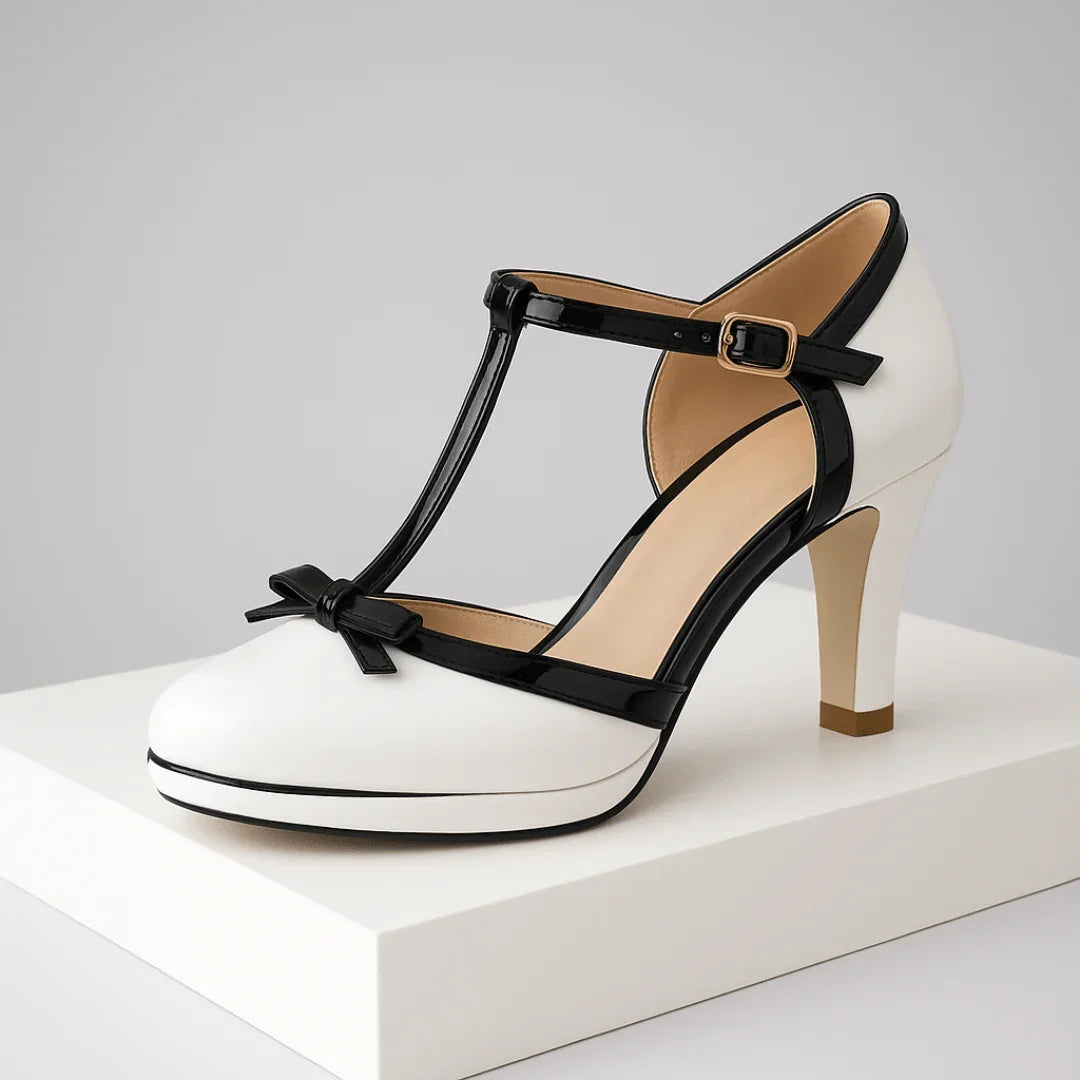White T-strap block heel shoe with bow detail, front view