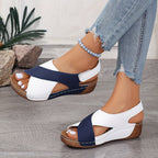 Woman in two-tone wedge sandals, casual summer look
