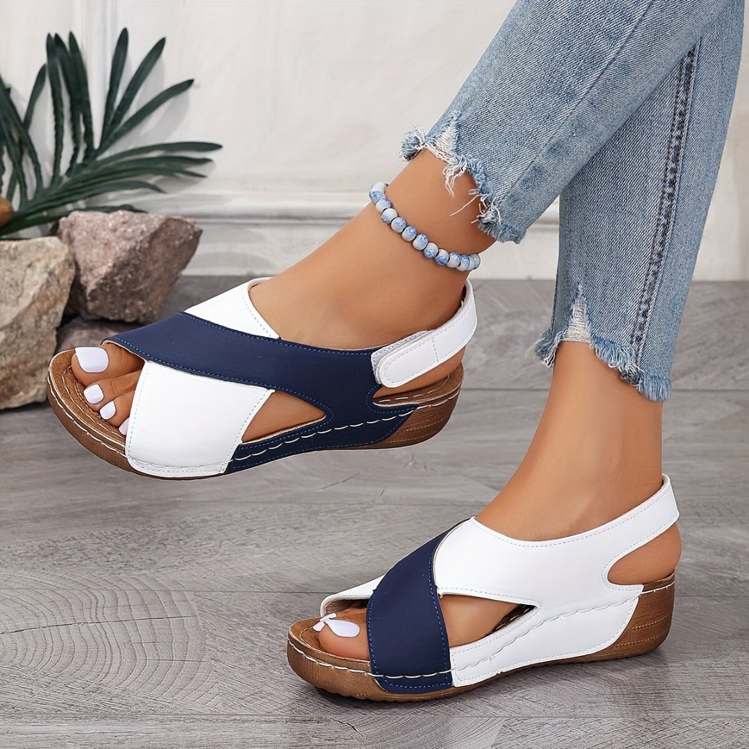 Woman in two-tone wedge sandals, casual summer look