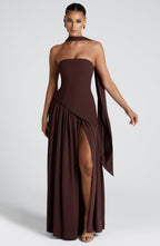 Full-length shot of dress showing floor-sweeping hem and draping