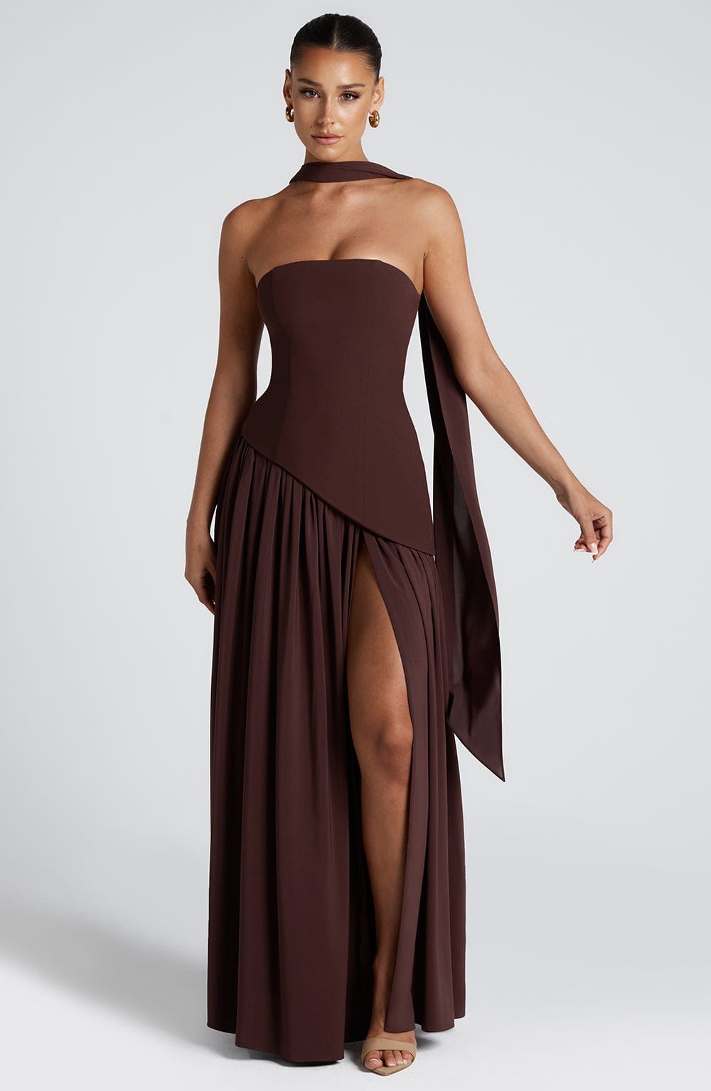 Full-length shot of dress showing floor-sweeping hem and draping