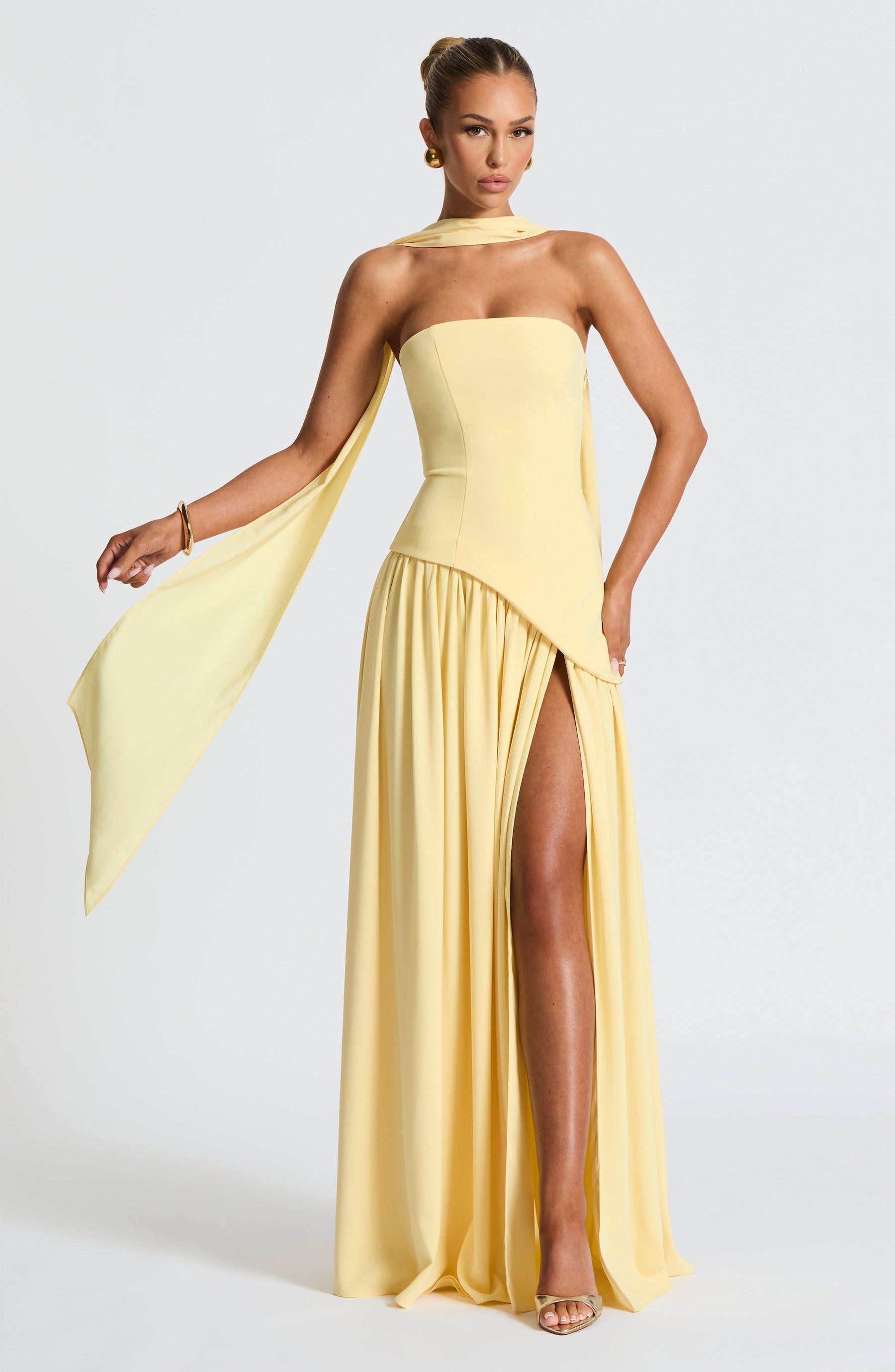 Back view of strapless maxi dress with asymmetric overlay