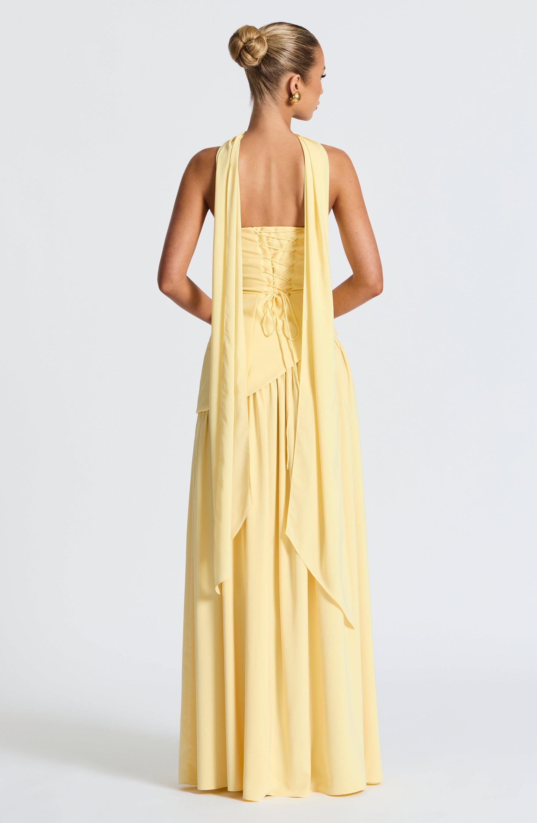 Close-up of structured bodice and detachable collar detail
